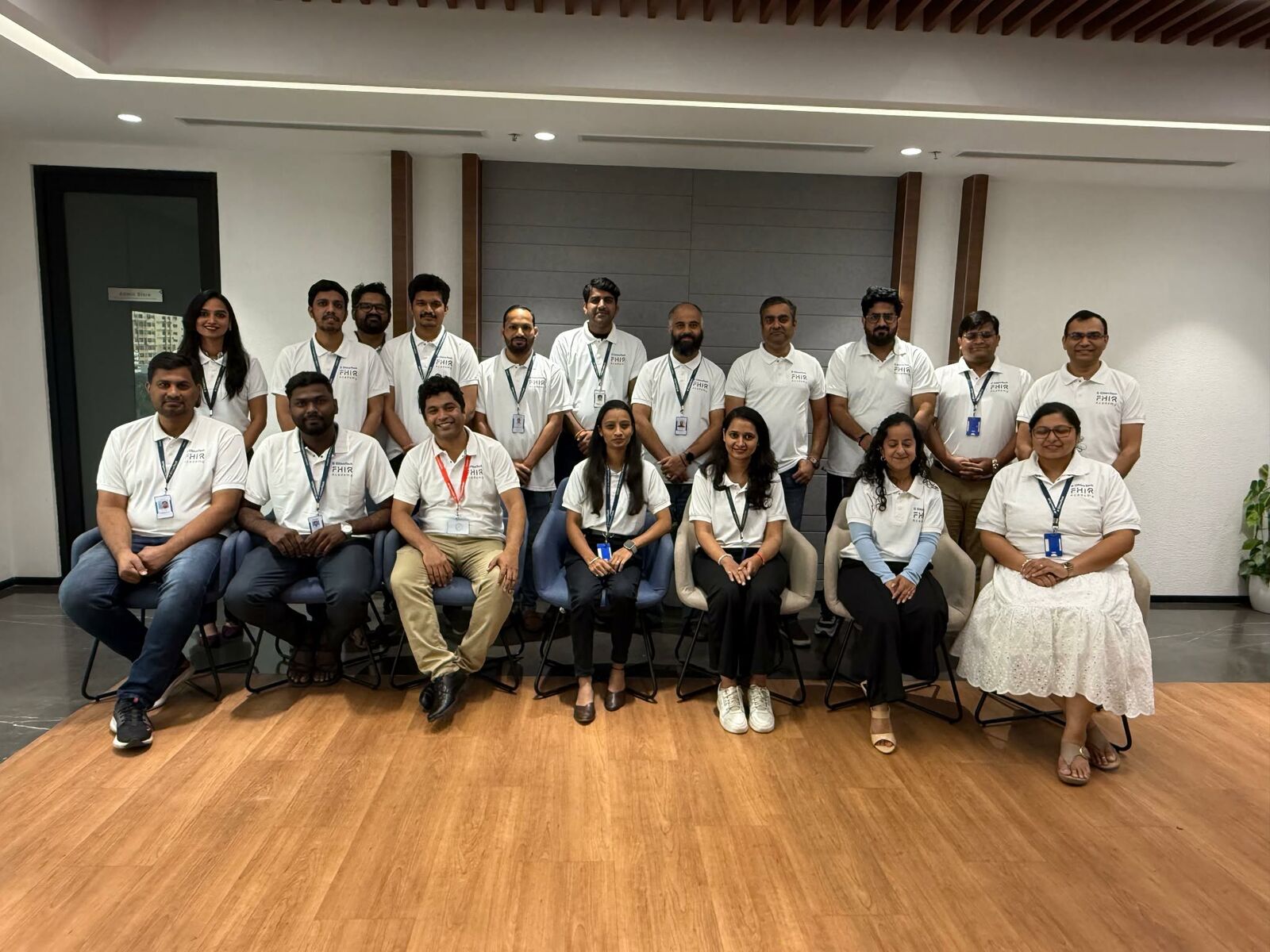 Members of the FHIR Academy cohort standing and seated together for a group photo.